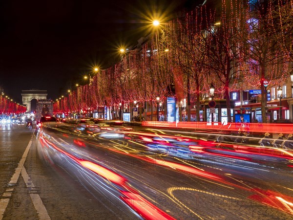 Night shot of the Christmas illumination of the Avenue des Champs-Elysees