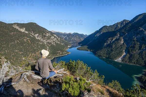 Hiker rests and looks into the distance