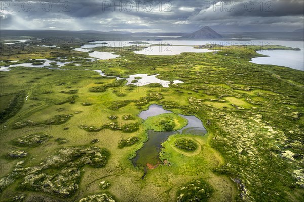 Finely structured landscape with green vegetation and small lakes and islands