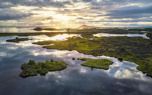 Aerial view of small green islands in the lake