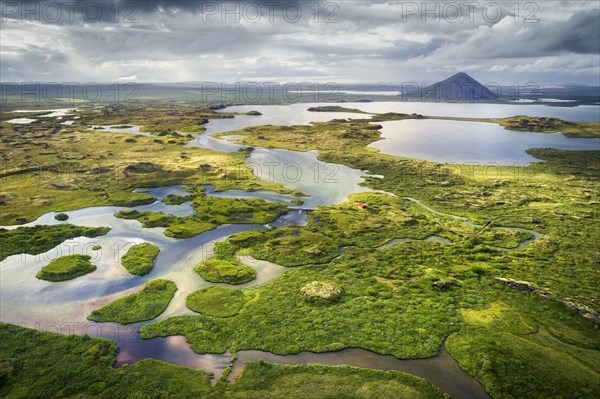 Finely structured landscape with green vegetation and small lakes and islands