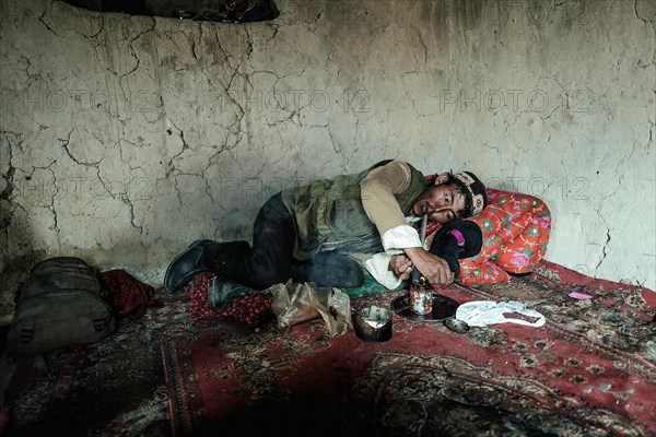 Man lying on a carpet