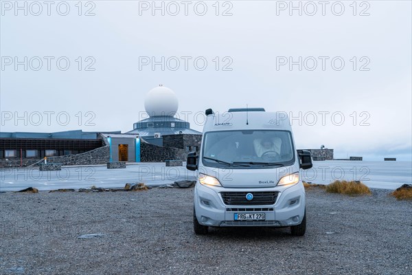 Campervan parked in front of the North Cape building