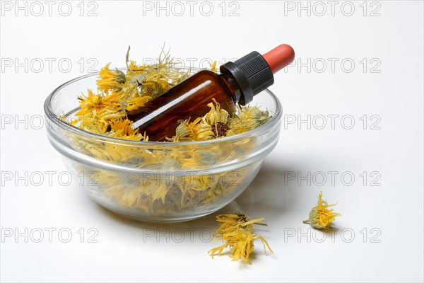 Dried calendula blossoms in bowl