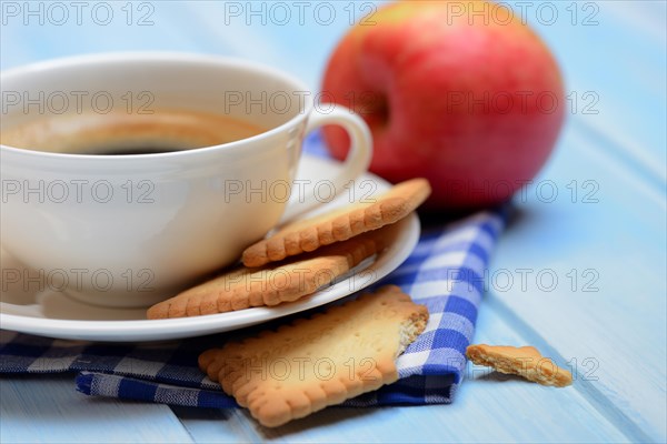 Butter biscuits and cup of coffee