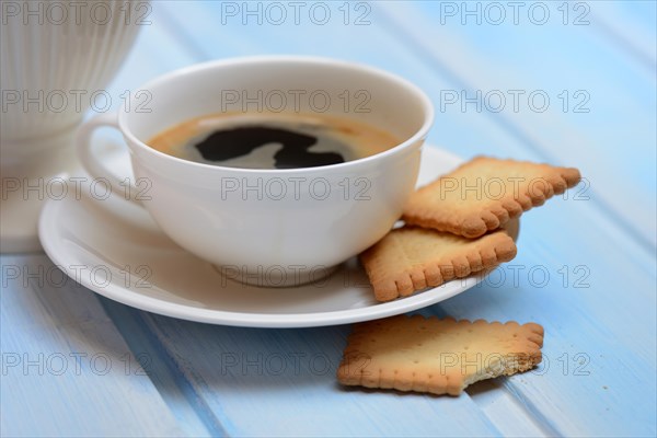 Butter biscuits and cup of coffee