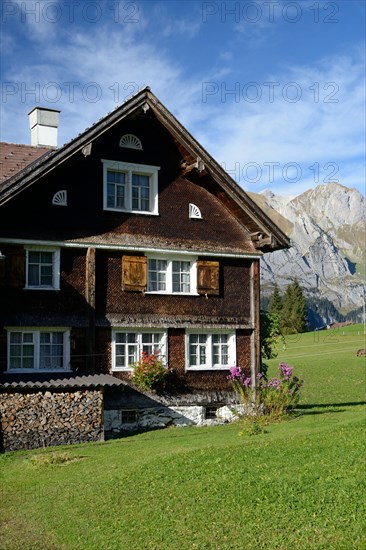 Farmhouse with wooden shingles