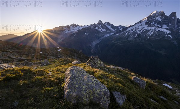 Sun shines over mountains