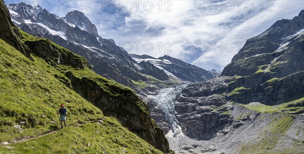 Hiking in the mountains on hiking trail to Grindelwald