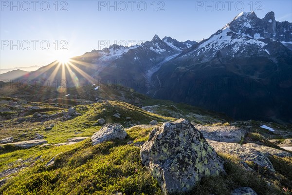 Sun shines over mountains