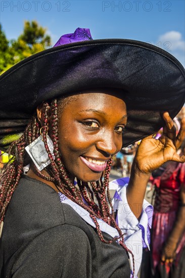 Girl posing at the Carneval in the town of Sao Tome