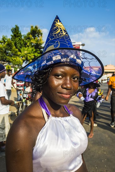 Girl posing at the Carneval in the town of Sao Tome