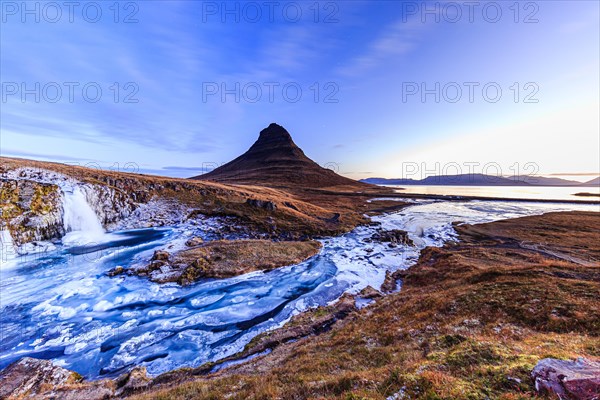 Morning atmosphere at Kirkjufell with waterfall Kirkjufellsfoss