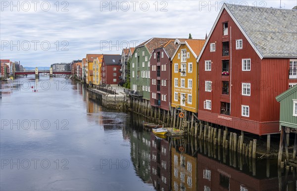 Colourful historic warehouses by the river Nidelva