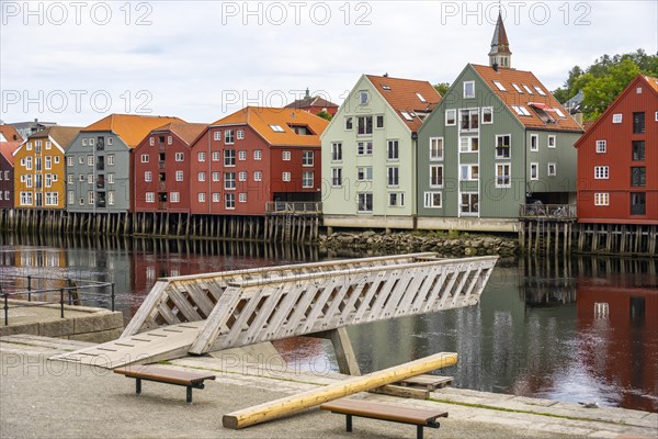 Colourful historic warehouses by the river Nidelva