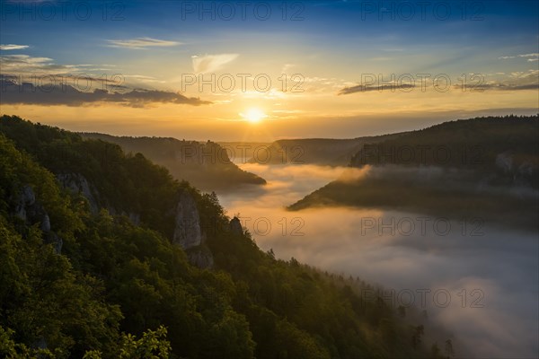 View from Eichfelsen to Werenwag Castle with morning fog