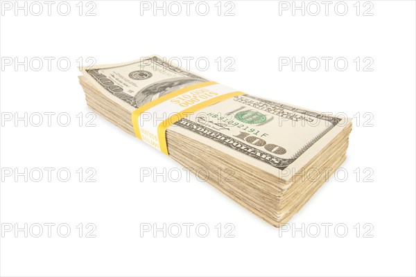 Stack of ten thousand dollar pile of one hundred dollar bills isolated on a white background