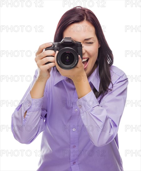 Attractive mixed-race young woman with DSLR camera isolated on a white background