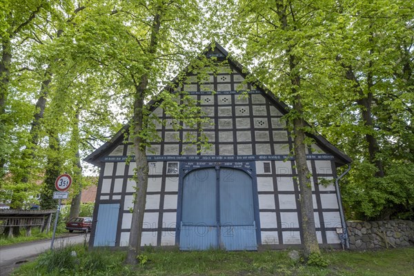 Half-timbered house in the round village of Satemin