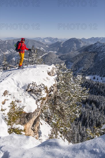 Young woman on ski tour