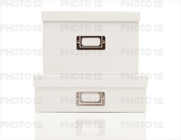 Stacked blank white file boxes with lids isolated on a white background ready for your own message