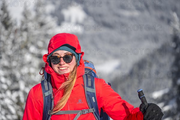 Young woman on ski tour