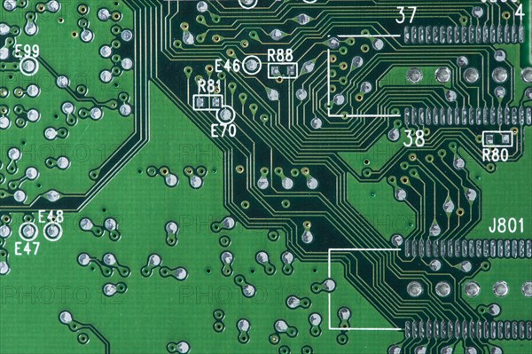 Tracks and solder joints on a motherboard of a computer