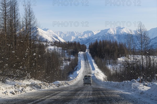 Minivan driving on the Road of Bones