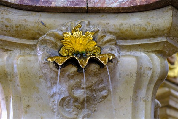 Water flowing from the high altar