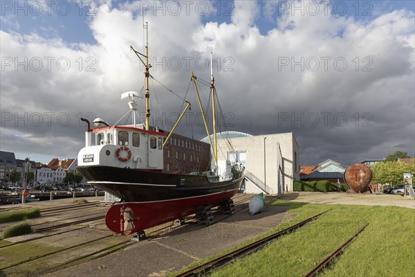 Slipway of the historic shipyard with museum ship