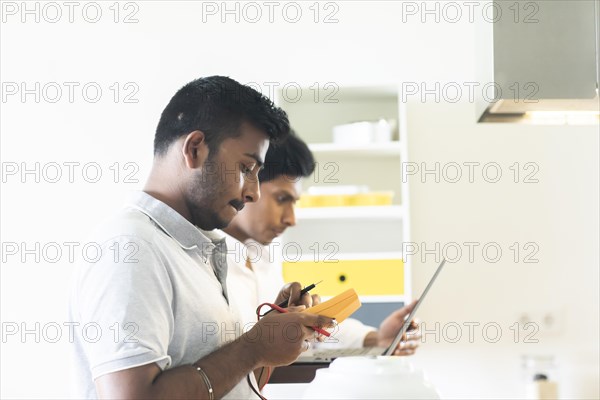 Students in an internship at the university with work equipment