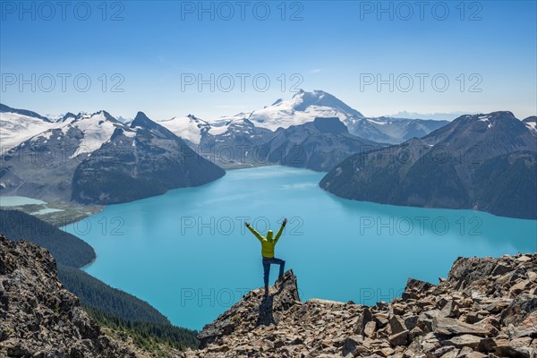 Young man standing on a rock