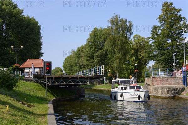 Boat on canal between Lake Kisajno and Lake Niegocin