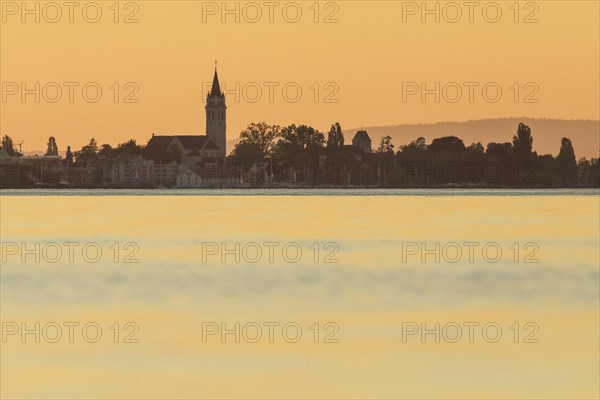 Church and harbour of Romanshorn in the evening light