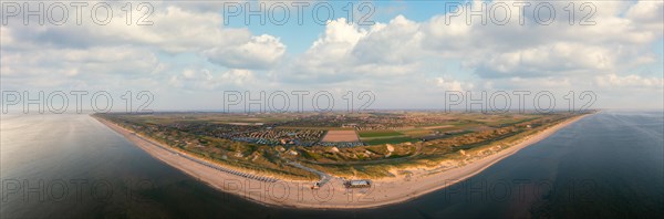 Large panoramic drone shot of the coast in front of Julianadorp aan Zee with a view of the beach