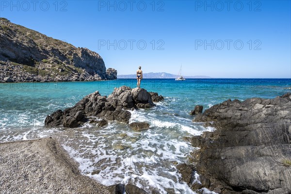 Young woman in swimwear on the beach at Gyali