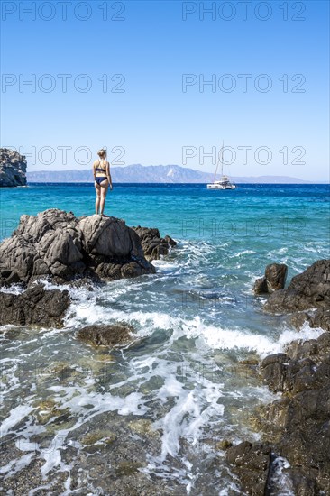 Young woman in swimwear on the beach at Gyali