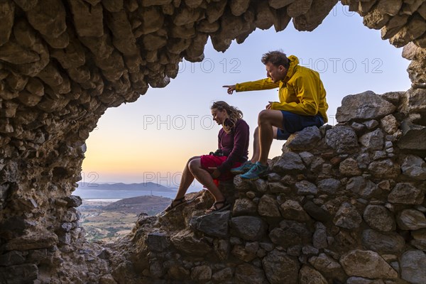 Two tourists looking over the landscape