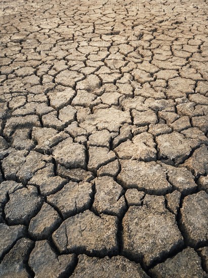Dry and broken clay ground during drought season