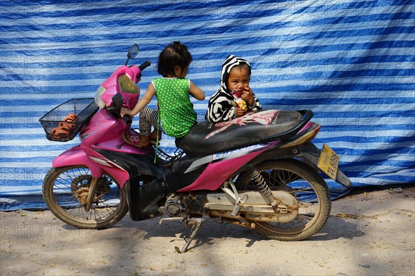 Children on moped