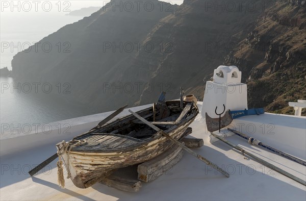 Old rowing boat on terrace roof