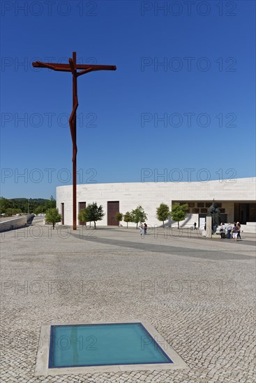 Cross in front of the Church of the Holy Trinity