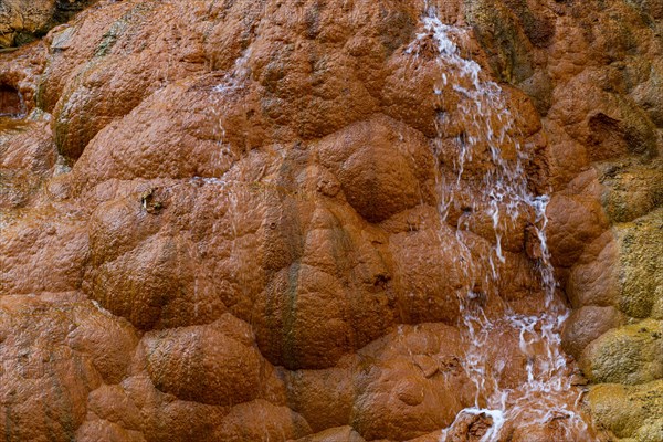 Colourful deposits in the hot springs in the Pai Mori gorge