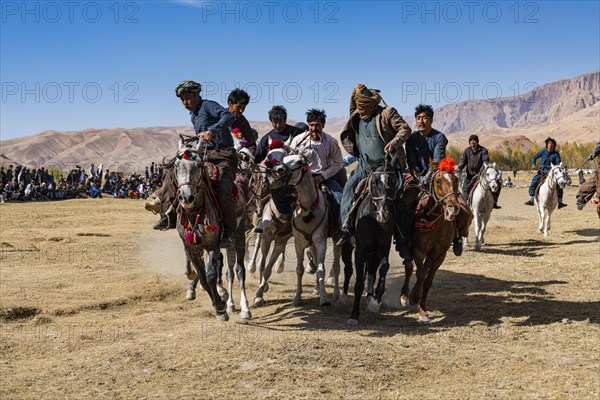 Men practising a traditional Buzkashi game