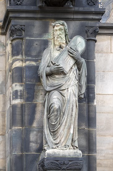 Sculpture of Moses with tablets of the law on the facade of St. Peter's Cathedral