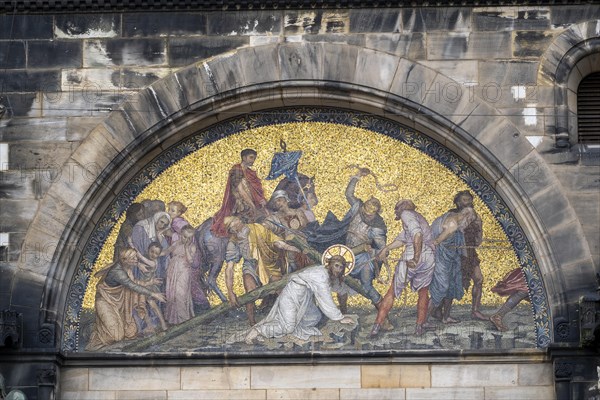 Mosaic depicting Jesus carrying the cross above the portal of St. Peter's Cathedral