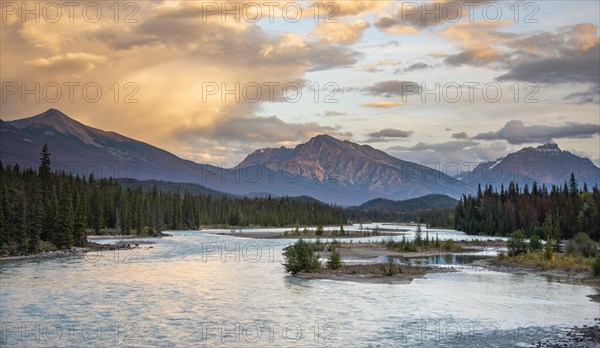 View of a valley with river in evening mood