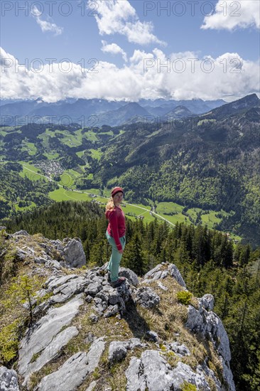 Hiker looking over the Chiemgau valley