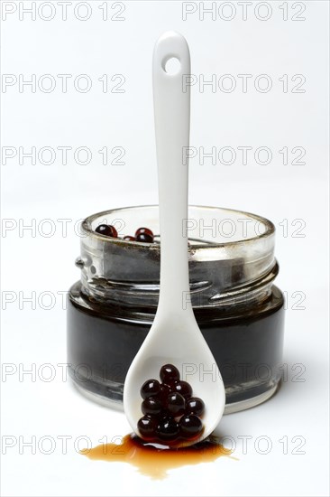 Aceto pearls in glass and spoon