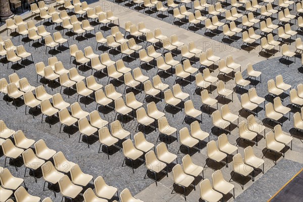 Many chairs for an audience in the amphitheater create a nice pattern